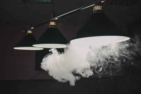 Pool table lighting and hookah smoke Stock Photos