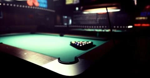 Pool table ready for a game in a dimly lit bar setting Stock Illustration