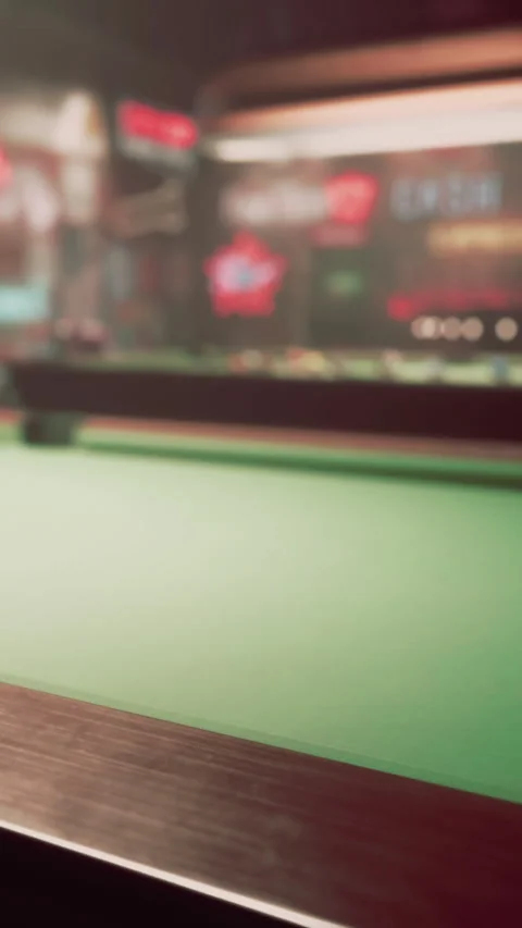 Pool table ready for game at night in local bar with city lights Stock Footage 337969358