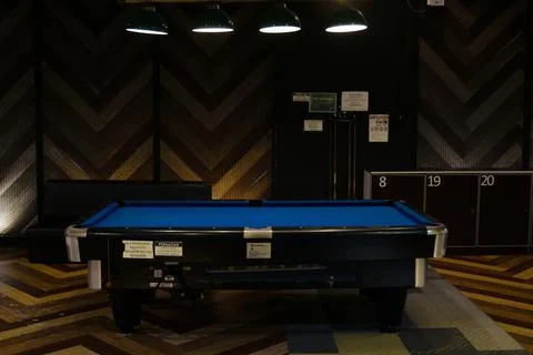Pool table room with notification notice and sticker at the wall Stock Photos