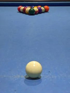 Pool table, snooker balls, cue ball, blue felt surface, triangular rack, sp.. Stock Photos