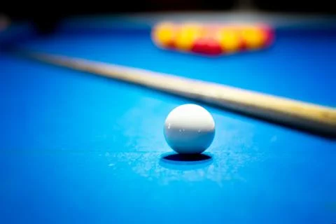 Pool table with the white ball in focus Stock Photos