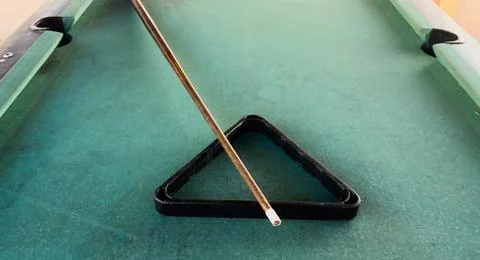 Pool table without balls in the hotel in the open air under a canopy. Stock Photos