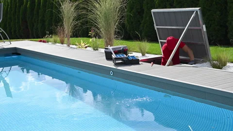 Pool Technician Performing Water Pump Repair Stock Footage 240487588