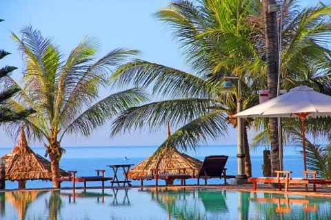 Pool on a tropical beach Stock Photos