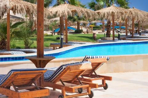 Pool at tropical beach Stock Photos