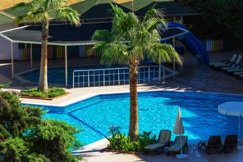 Pool in tropical resort Stock Photos