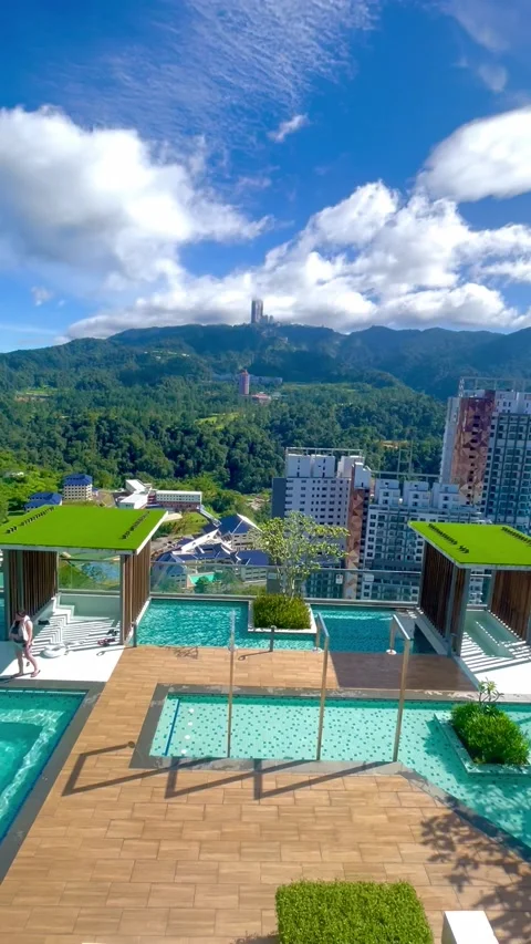 Pool view from the top floor of Windmill Upon Hills Premium Suites apartment Stock Footage 295471214
