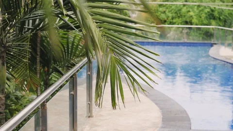 Pool water closeup. Hotel pool in the tropics. luxurious hotel pool 库存影片 125993565