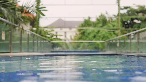 Pool water closeup. Hotel pool in the tropics. luxurious hotel pool Stock-Footage 126313068