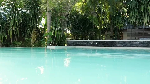 Pool water closeup. Hotel pool in the tropics. luxurious hotel pool 库存影片 126313382