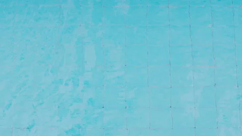 Pool water pattern. Top view of the swimming pool with blue water Stock Footage 192977946