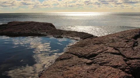 Pool of water in rocks on the ocean Stock Footage 55014431