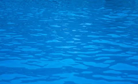 Pool water with sun reflections Stock Photos