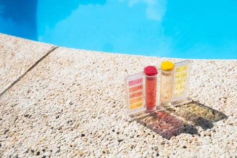 Pool Water Testing Kit with Color Indicators for Monitoring pH and Chlorine.. Stock Photos