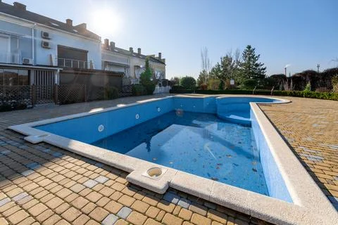 A pool with a white border and a blue top Stock Photos
