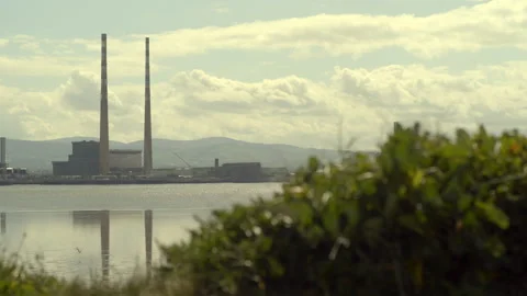 Poolbeg chimneys in Dublin Bay Stock Footage 244744178