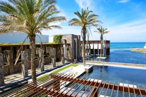 The pools and beach at luxury hotel, Crete, Greece Stock Photos