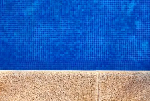 Poolside with clear water Stock Photos