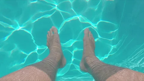 Poolside feet dangle Stock Footage 71967029