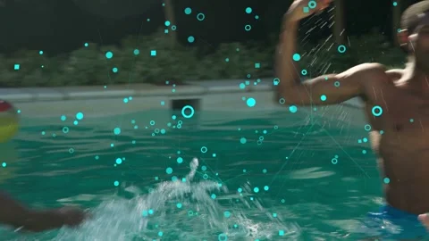 Poolside man bouncing beach ball, leaning and tossing it into pool to spark Stock Footage 332978590