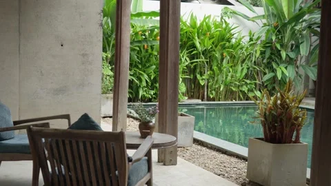 Poolside patio with tropical plants at a villa in Hue, Vietnam, 4K Stock Footage 341551697