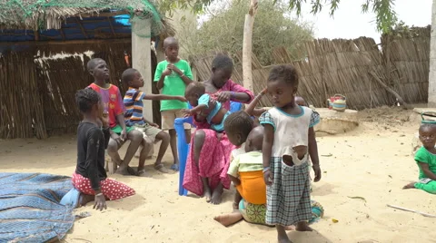 A group of african children playing in a park