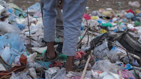 Poor Boys'S Legs Walking On Garbage Dump Stock Footage 153711705