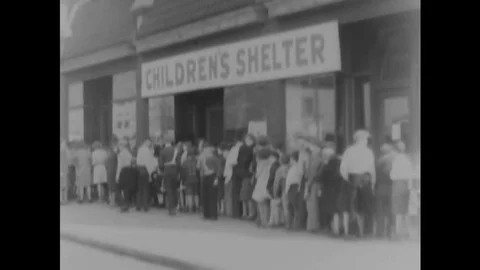 Poor children are fed by the state in 1931 during the Great Depression. Video stock 102969321