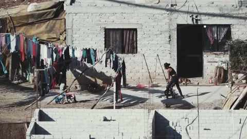 Poor children playing in the courtyard 스톡 동영상 146873219