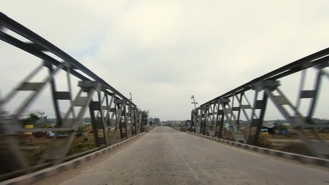 Poor development village with old humber house, green plants and paddy fields Video stock 127713749
