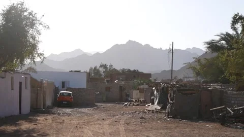 Poor Dwelling in a Middle Eastern Village With Distant Mountains Stock Footage 243941723