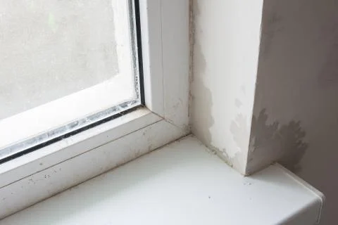 Poor installation of plastic windows, condensation and streaks on the slopes Stock Photos