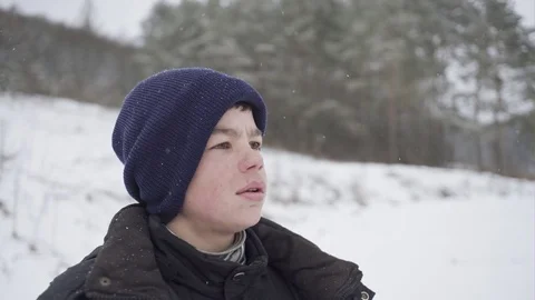 Poor lonely boy lost in the winter woods Видео 72788682