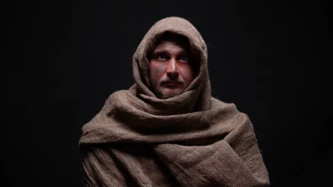 Poor male in rough robe looking directly to camera, early christian prophet Stock Footage 104801465
