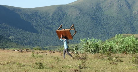 Poor Man carrying a Table Stock Footage 293124413