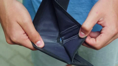 The poor man looks at the empty wallet 스톡 동영상 159657124