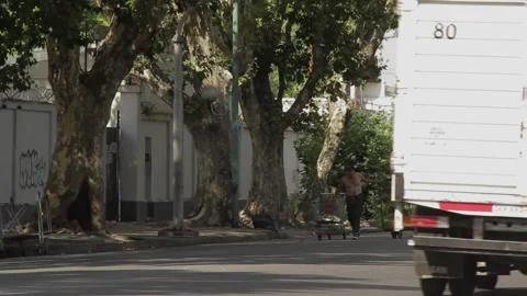Poor Man Pulling Carts on a Street in Buenos Aires, Argentina. Stock Footage 170466321