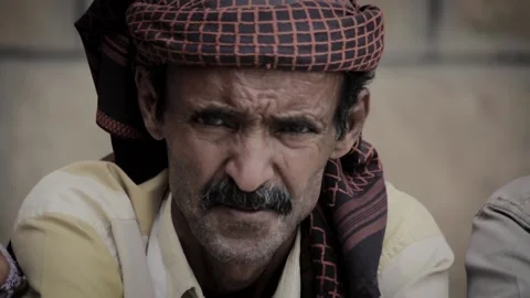 A poor man suffers because of the war and the siege in Yemen, Taiz Stock Footage 160061103