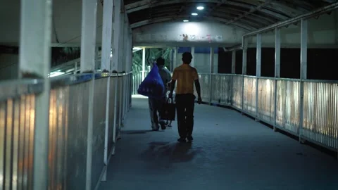 Poor Man Walking Alone on City Street at Night Stock Footage 320363123