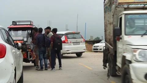Poor people are waiting for e rikshaw Stock Footage 205256145