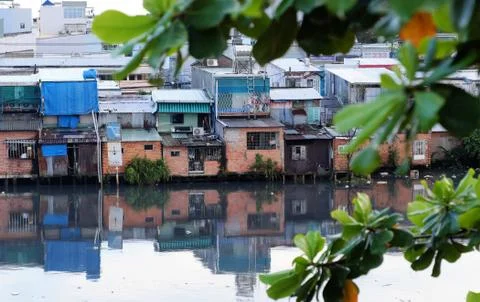 Poor riverside temporary home Stock Photos