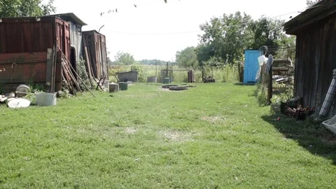Poor rural courtyard Stock Footage 79754560