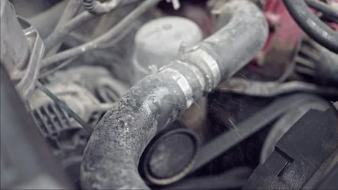 Poor service and poor quality auto part. Vehicle blown Radiator Dripping Coolant Stock Footage 223558057