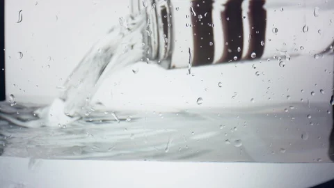 Poor some water in a tank - UHD Prores 422 Stock Footage 104254698