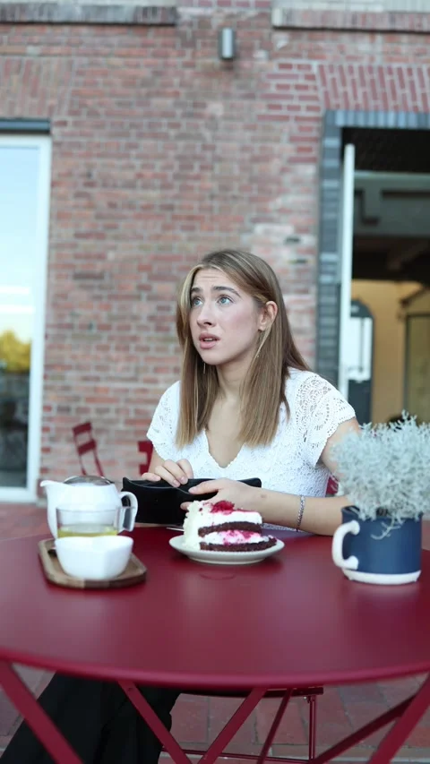 Poor student shows empty wallet and asks waiter to leave without paying Stock Footage 344448319