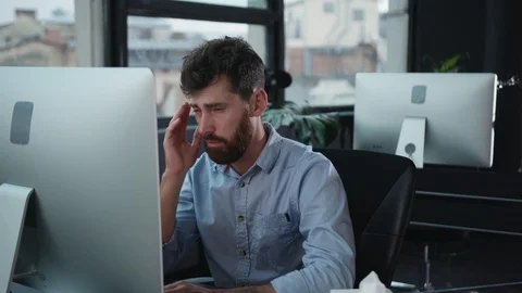 Poor tired office worker feeling sick sneezing allergy with paper tissues Stock Footage 118391549