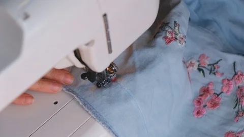 Poor unknown asian woman works as a seamstress Stock Footage