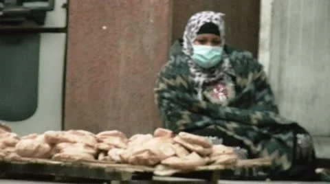 Poor woman and bread 動画素材 10786625
