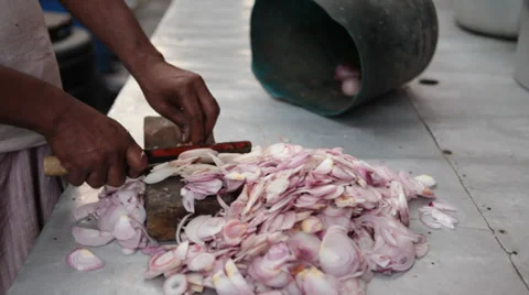 Poor worker cutting onions Stock Footage 37219033
